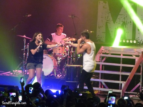 Jake Miller and a fan on stage